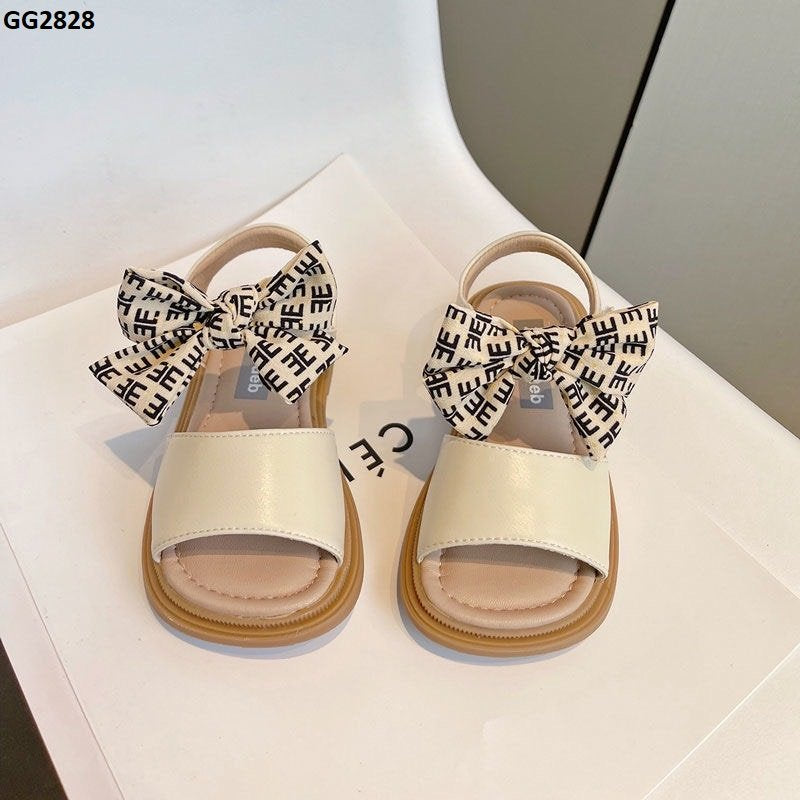 BLACK AND WHITE BOW SANDALS